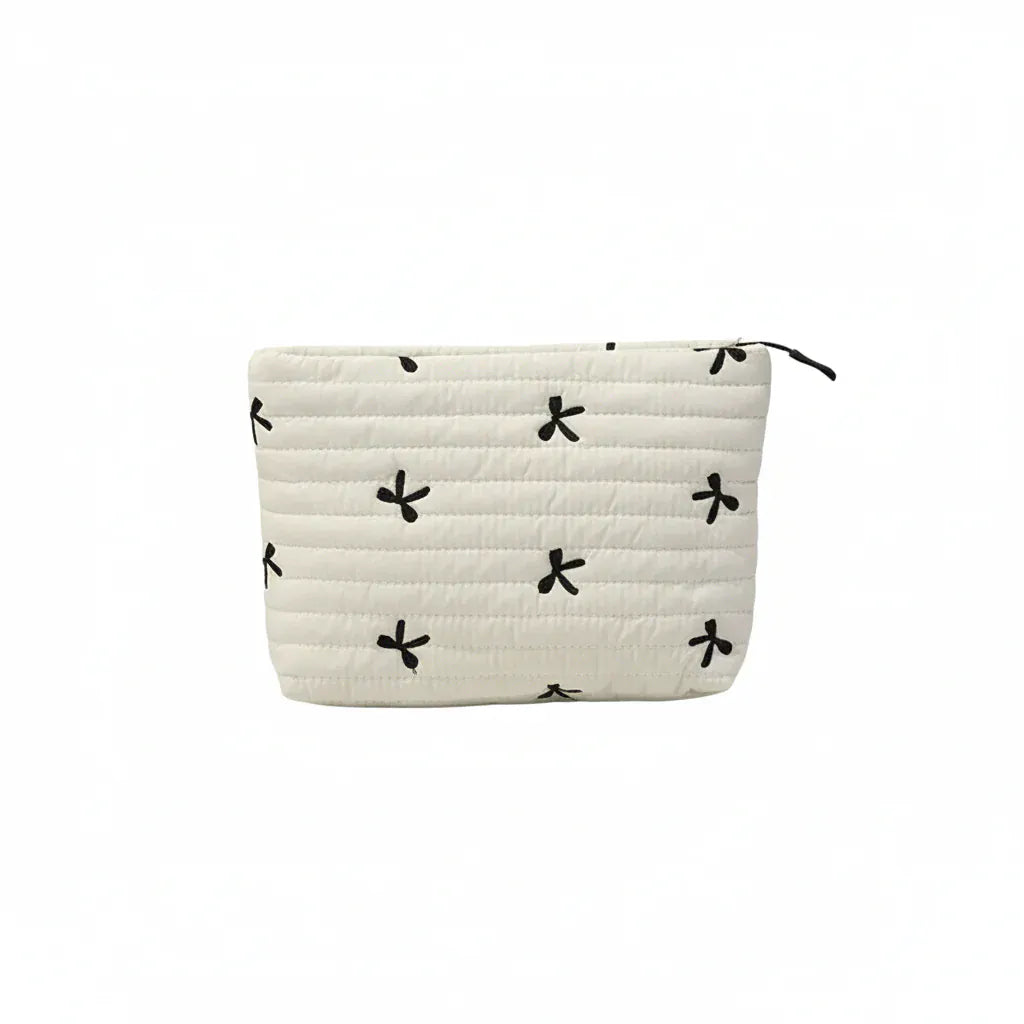 Trousse de Toilette Femme Matelassée avec Broderies Nœuds Ivoire