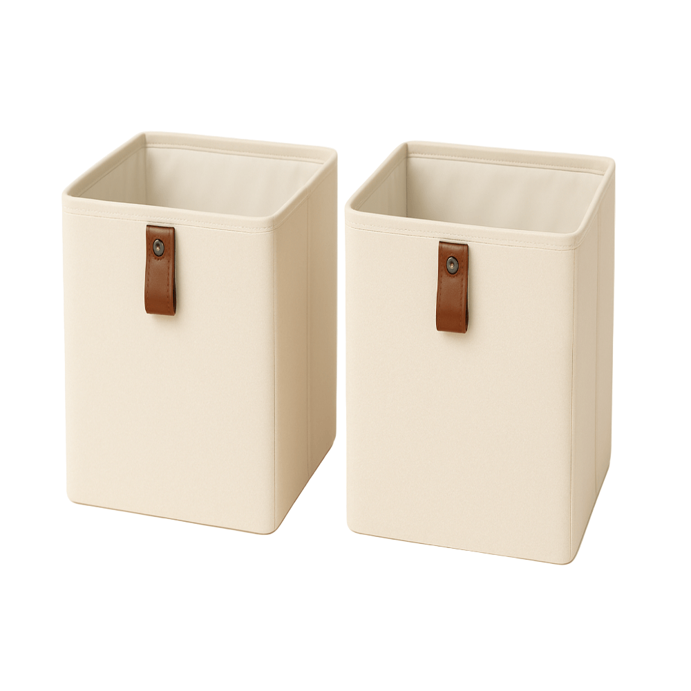Deux boîtes beiges avec poignées en cuir