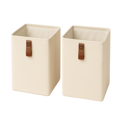 Deux boîtes beiges avec poignées en cuir