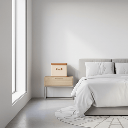 Une boîte beige avec poignée cognac